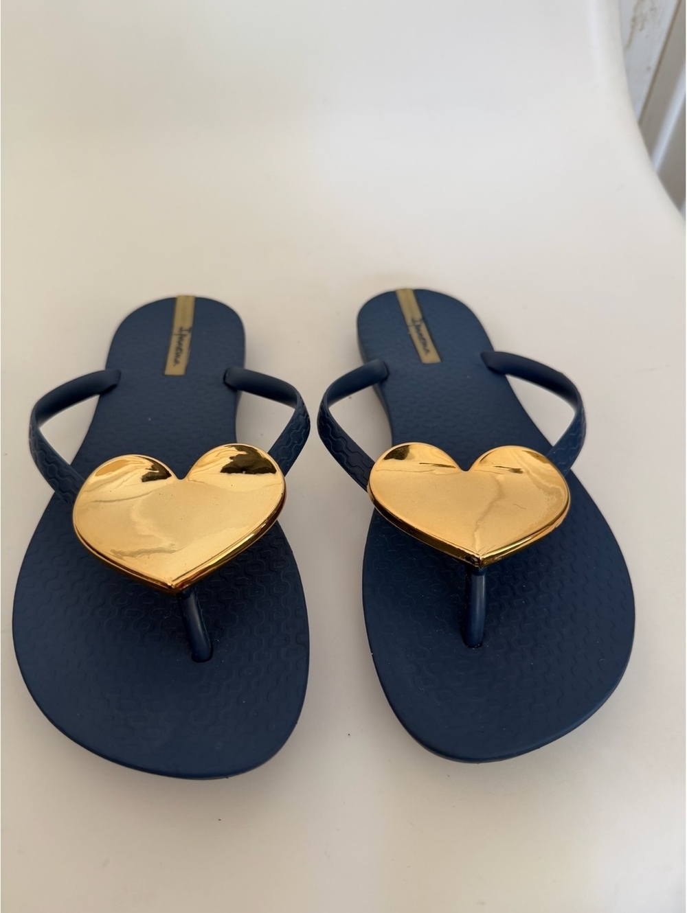 Ipanema blue flip flops with gold heart